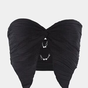 Cute black tube top that criss crosses with pearls. XS.